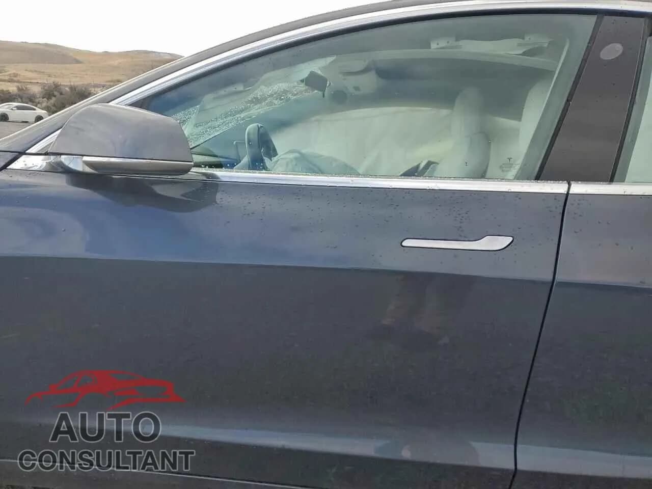 2018 TESLA MODEL 3 Damaged VIN 5YJ3E1EB2JF056264 – exterior detail 2018 TESLA MODEL 3 Damaged VIN 5YJ3E1EB2JF056264 – exterior detail