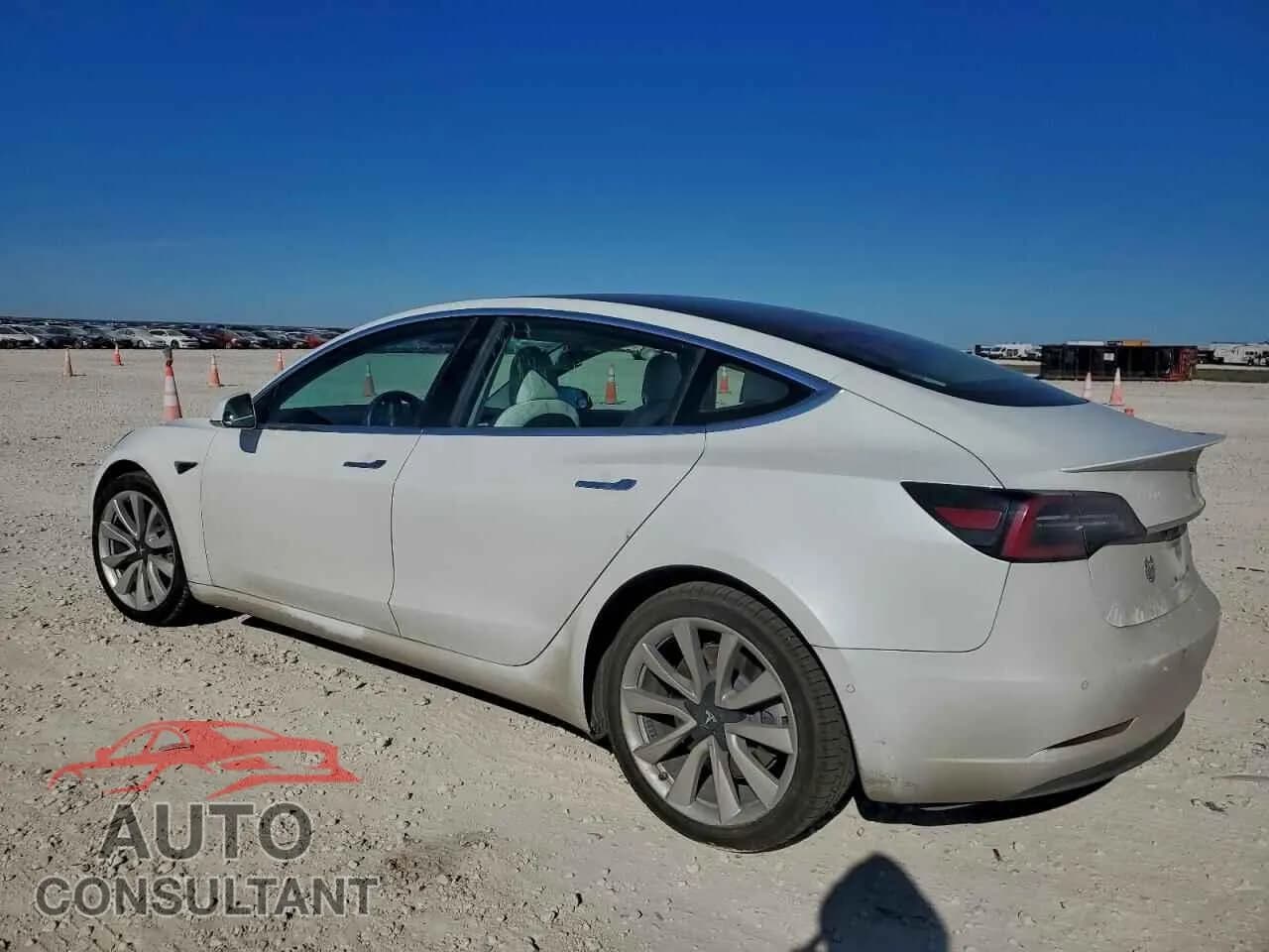 2018 TESLA MODEL 3 Damaged VIN 5YJ3E1EB2JF135644 – rear exterior 2018 TESLA MODEL 3 Damaged VIN 5YJ3E1EB2JF135644 – rear exterior