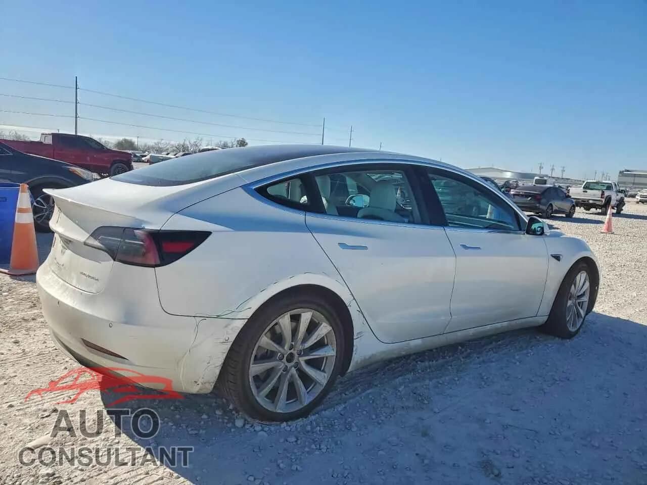 2018 TESLA MODEL 3 Damaged VIN 5YJ3E1EB2JF135644 – side profile 2018 TESLA MODEL 3 Damaged VIN 5YJ3E1EB2JF135644 – side profile