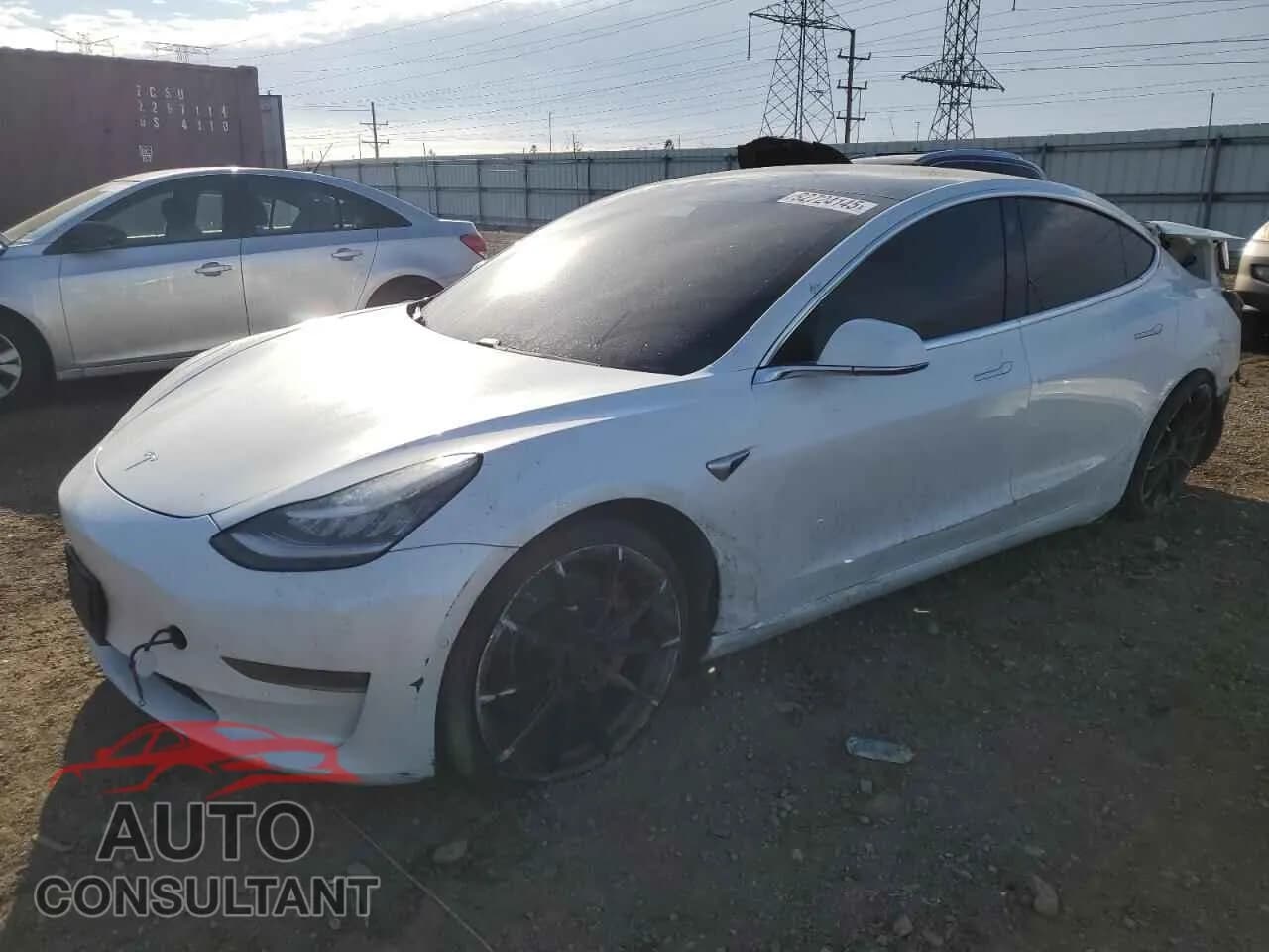 2020 TESLA MODEL 3 Damaged VIN 5YJ3E1EC5LF703798 – front exterior 2020 TESLA MODEL 3 Damaged VIN 5YJ3E1EC5LF703798 – front exterior