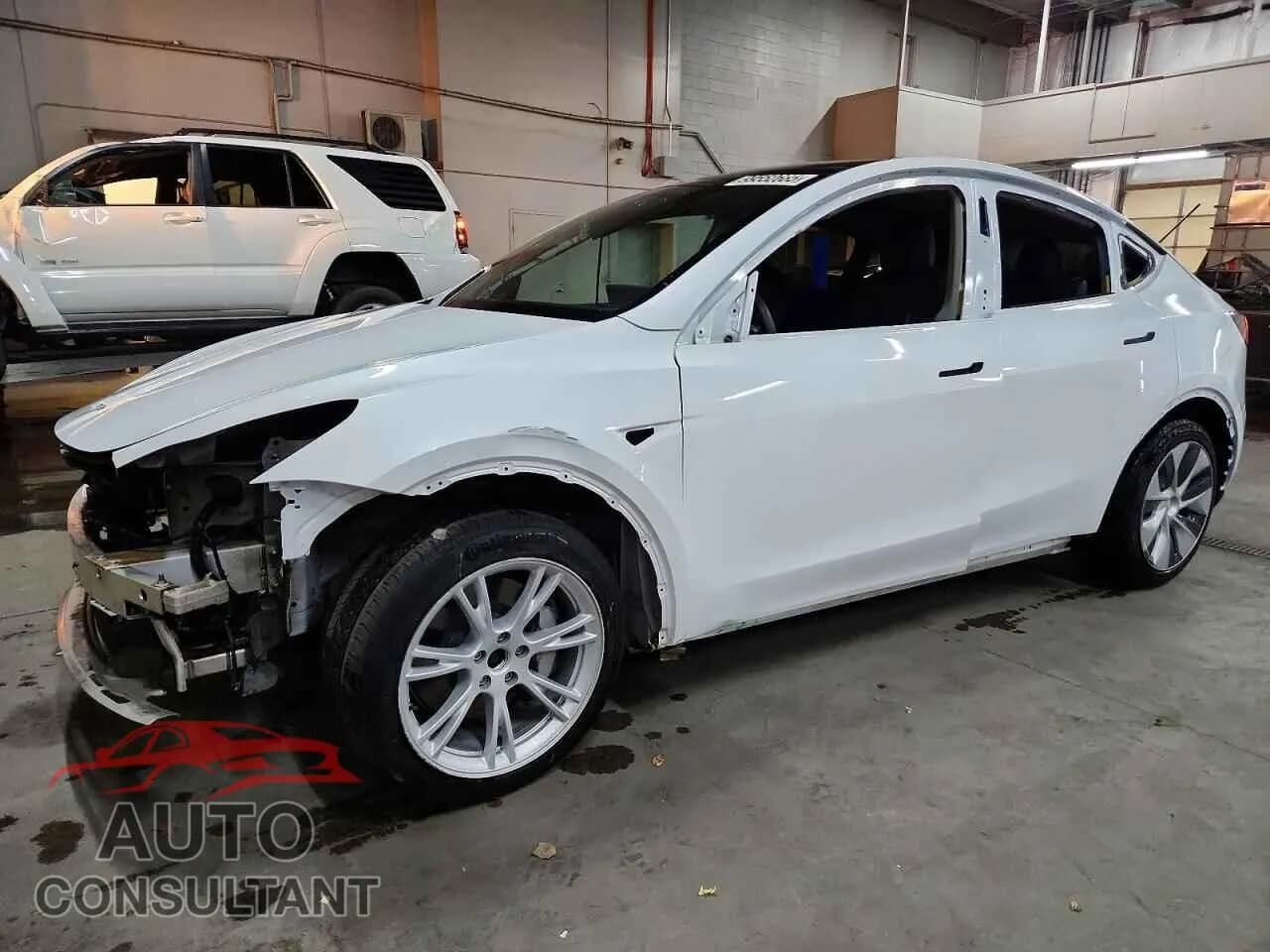2021 TESLA MODEL Y Damaged VIN 5YJYGAEE5MF301007 – front exterior 2021 TESLA MODEL Y Damaged VIN 5YJYGAEE5MF301007 – front exterior