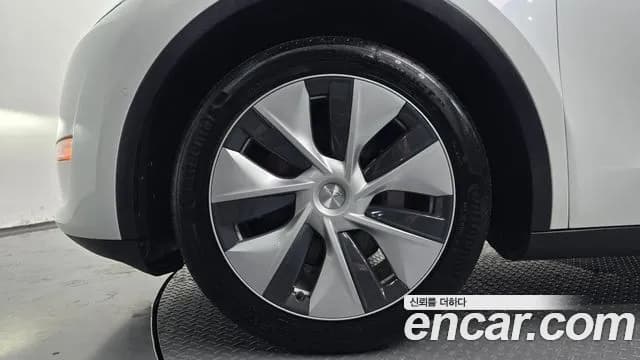 2021 Tesla Model Y Standard Range RWD Sold VIN 5YJYGDED8MF239210 – exterior detail 2021 Tesla Model Y Standard Range RWD Sold VIN 5YJYGDED8MF239210 – exterior detail