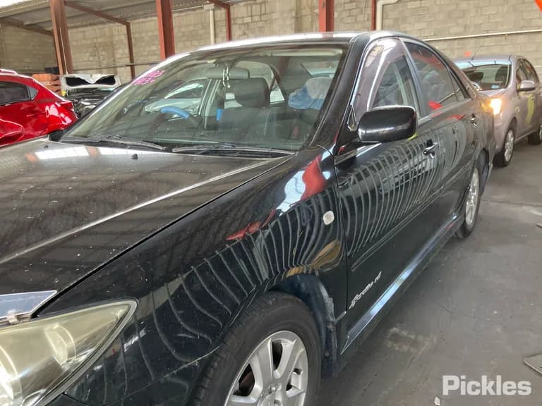 2004 Toyota Camry Used VIN 6T153XK360X303112 – exterior detail 2004 Toyota Camry Used VIN 6T153XK360X303112 – exterior detail