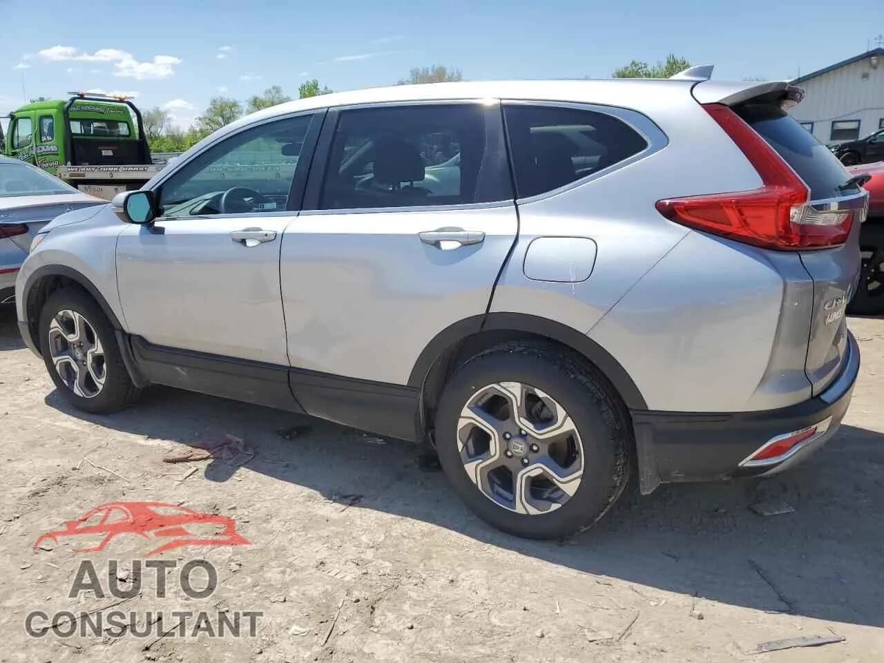 2018 HONDA CRV Damaged VIN 7FARW2H54JE063868 – rear exterior 2018 HONDA CRV Damaged VIN 7FARW2H54JE063868 – rear exterior