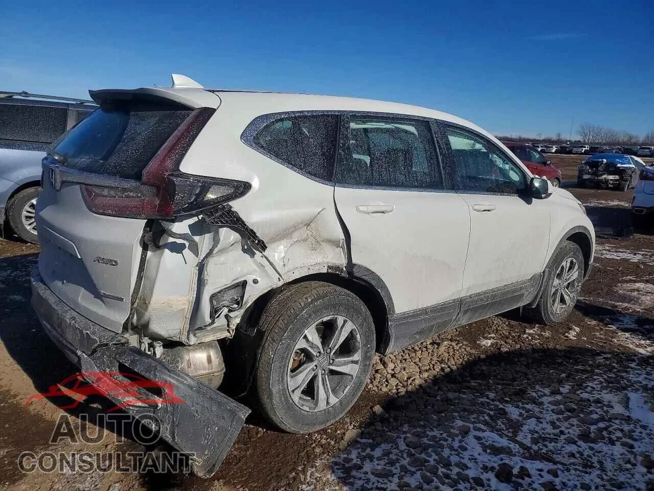 2021 HONDA CRV Damaged VIN 7FARW2H79ME032931 – side profile 2021 HONDA CRV Damaged VIN 7FARW2H79ME032931 – side profile