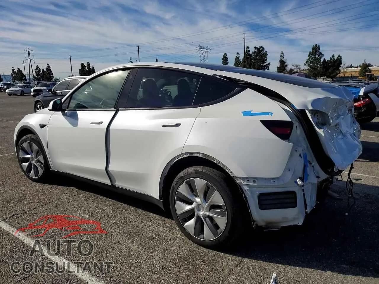 2023 TESLA MODEL Y Damaged VIN 7SAYGDEE0PA035806 – rear exterior 2023 TESLA MODEL Y Damaged VIN 7SAYGDEE0PA035806 – rear exterior