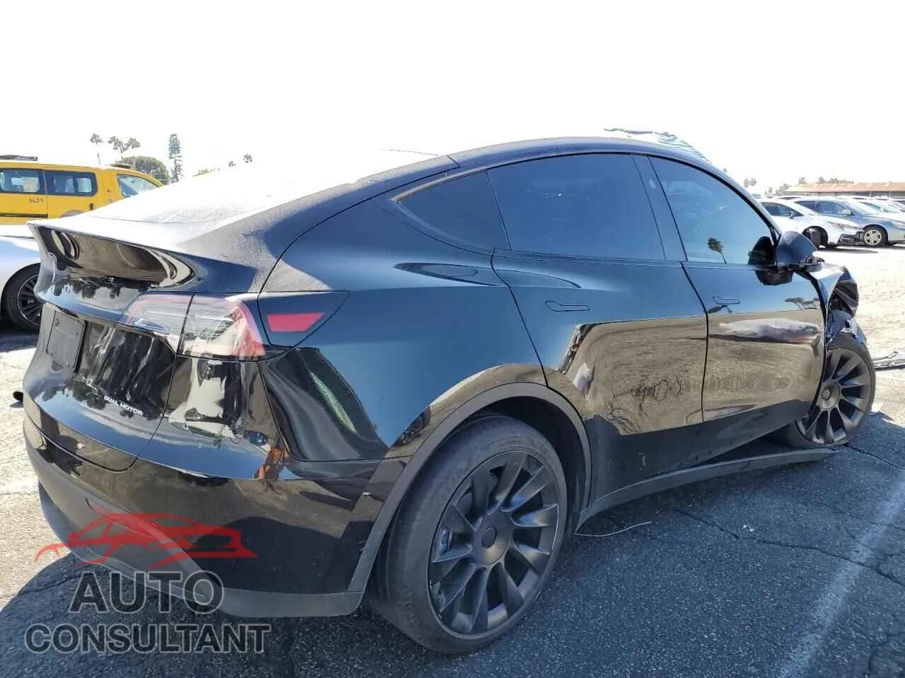 2023 TESLA MODEL Y Damaged VIN 7SAYGDEE0PA176391 – side profile 2023 TESLA MODEL Y Damaged VIN 7SAYGDEE0PA176391 – side profile