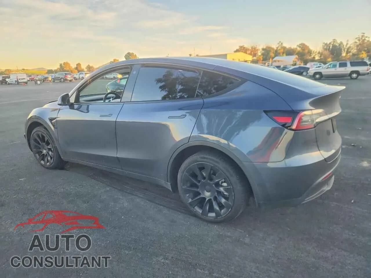 2022 TESLA MODEL Y Damaged VIN 7SAYGDEE3NF314487 – rear exterior 2022 TESLA MODEL Y Damaged VIN 7SAYGDEE3NF314487 – rear exterior