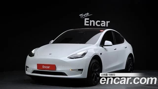 2022 Tesla Model Y Long Range AWD Sold VIN 7SAYGDEE3NF500174 – side profile 2022 Tesla Model Y Long Range AWD Sold VIN 7SAYGDEE3NF500174 – side profile