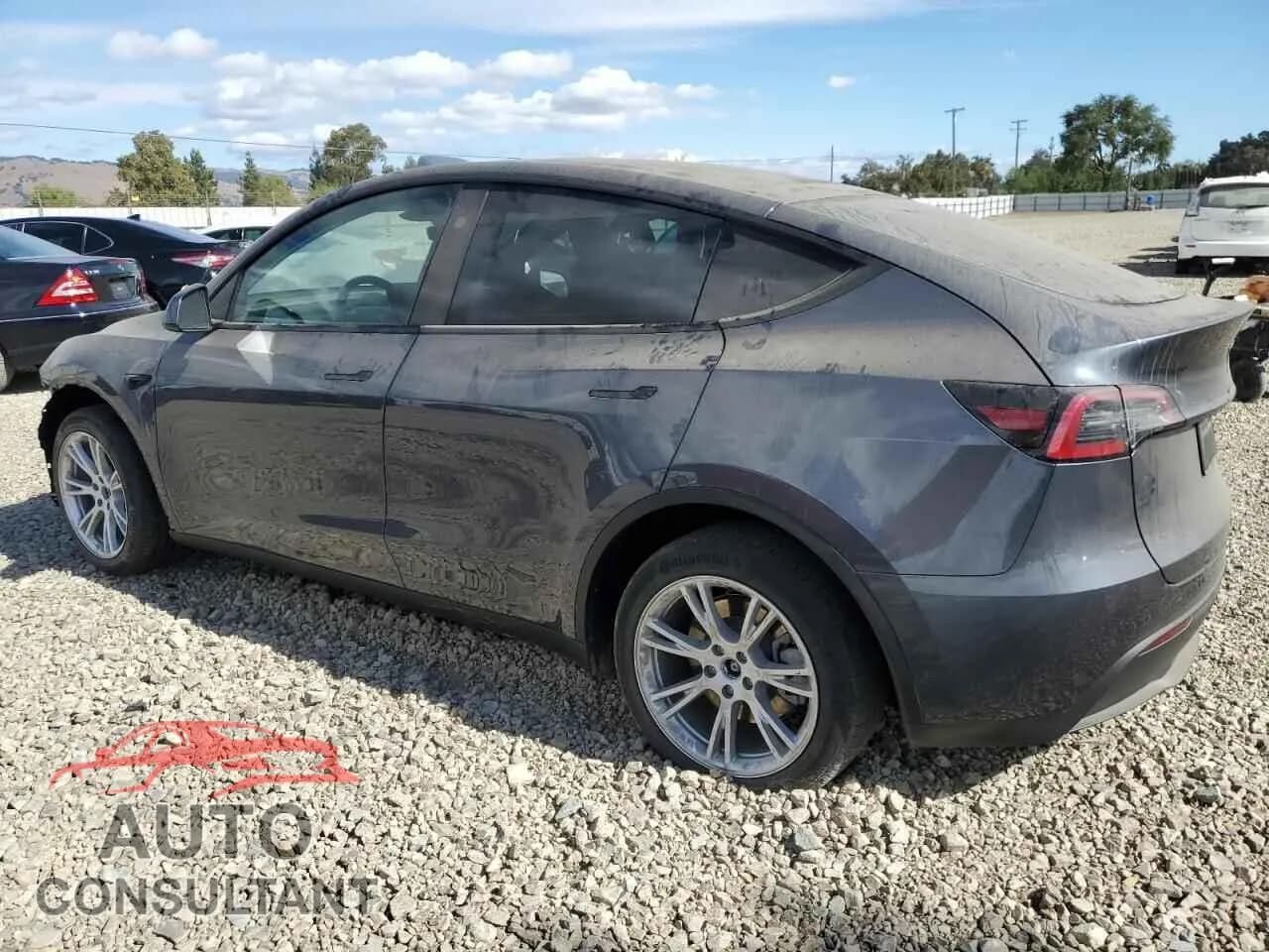 2023 TESLA MODEL Y Damaged VIN 7SAYGDEE8PA153084 – rear exterior 2023 TESLA MODEL Y Damaged VIN 7SAYGDEE8PA153084 – rear exterior
