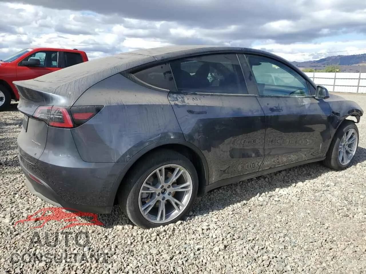 2023 TESLA MODEL Y Damaged VIN 7SAYGDEE8PA153084 – side profile 2023 TESLA MODEL Y Damaged VIN 7SAYGDEE8PA153084 – side profile