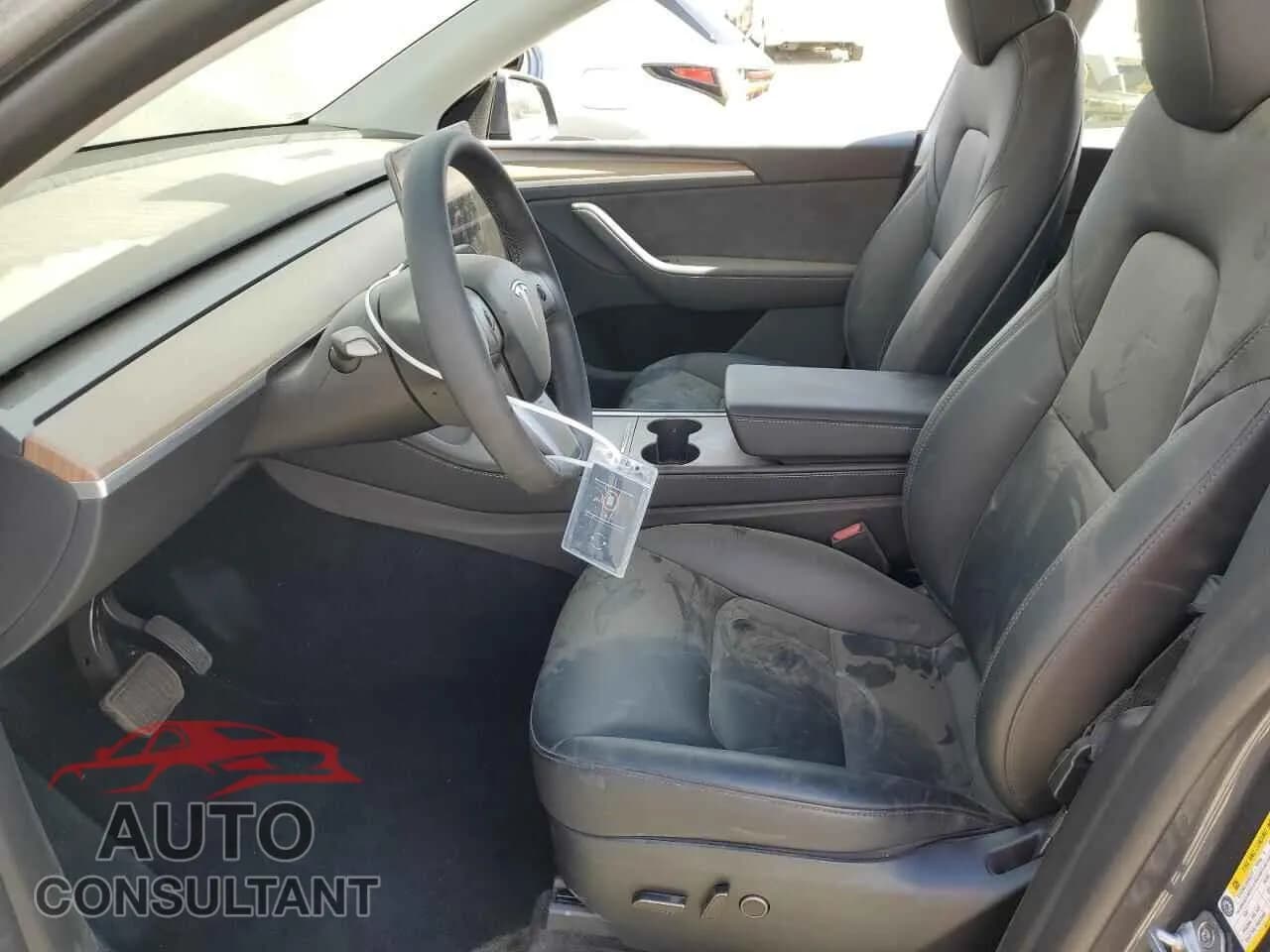 2023 TESLA MODEL Y Damaged VIN 7SAYGDEE8PA153084 – exterior detail 2023 TESLA MODEL Y Damaged VIN 7SAYGDEE8PA153084 – exterior detail