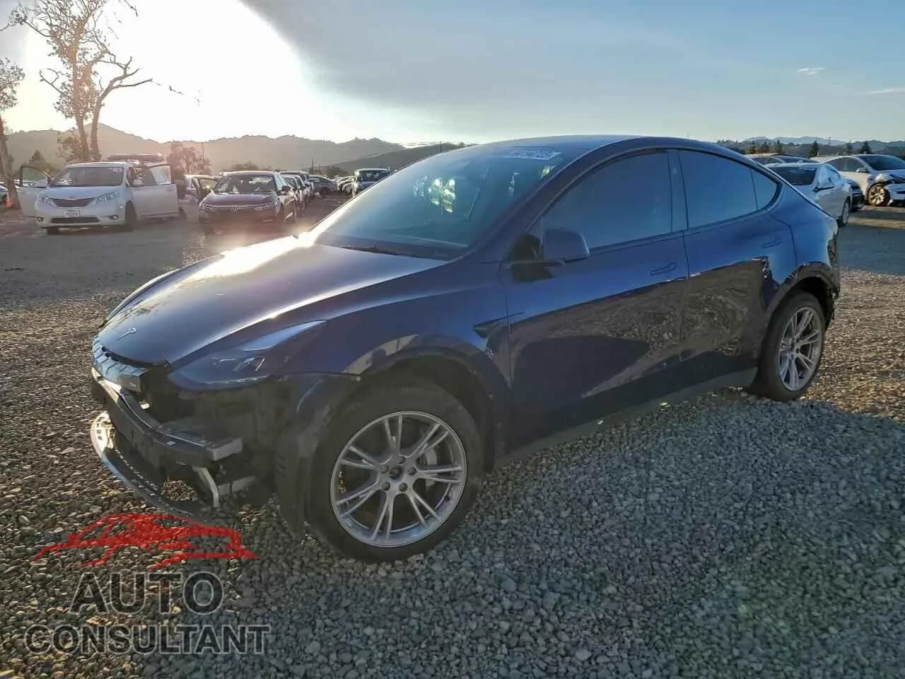 2023 TESLA MODEL Y Damaged VIN 7SAYGDEE9PF898767 – front exterior 2023 TESLA MODEL Y Damaged VIN 7SAYGDEE9PF898767 – front exterior