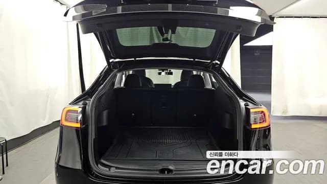 2022 Tesla Model Y Long Range AWD Sold VIN 7SAYGDEEXNF415543 – rear exterior 2022 Tesla Model Y Long Range AWD Sold VIN 7SAYGDEEXNF415543 – rear exterior