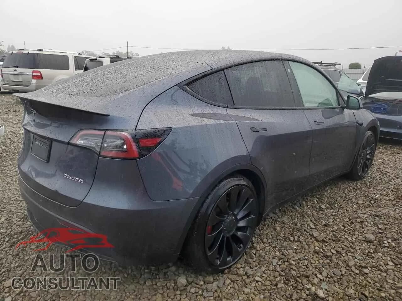 2022 TESLA MODEL Y Damaged VIN 7SAYGDEF7NF465423 – side profile 2022 TESLA MODEL Y Damaged VIN 7SAYGDEF7NF465423 – side profile