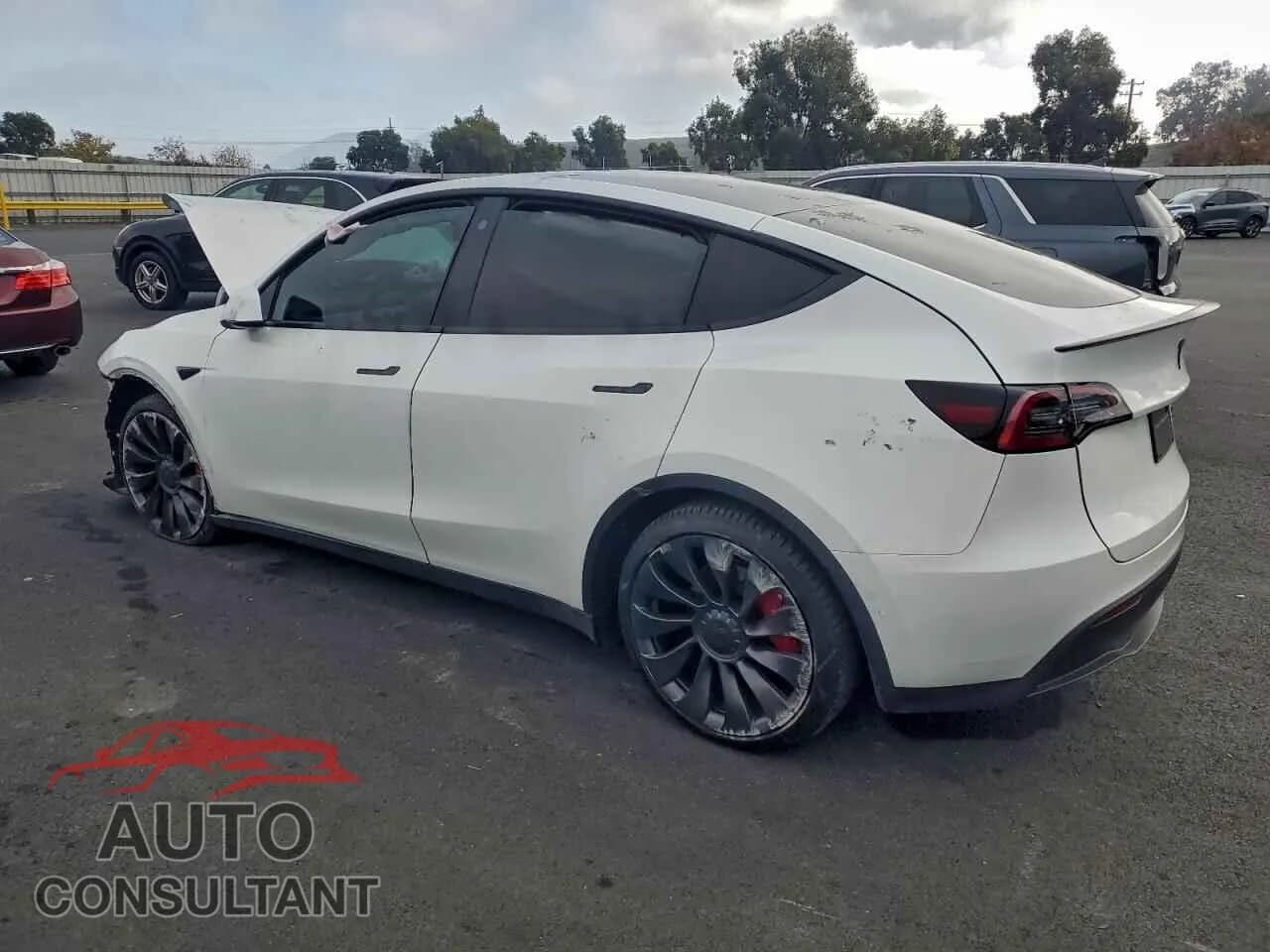 2022 TESLA MODEL Y Damaged VIN 7SAYGDEFXNF485715 – rear exterior 2022 TESLA MODEL Y Damaged VIN 7SAYGDEFXNF485715 – rear exterior