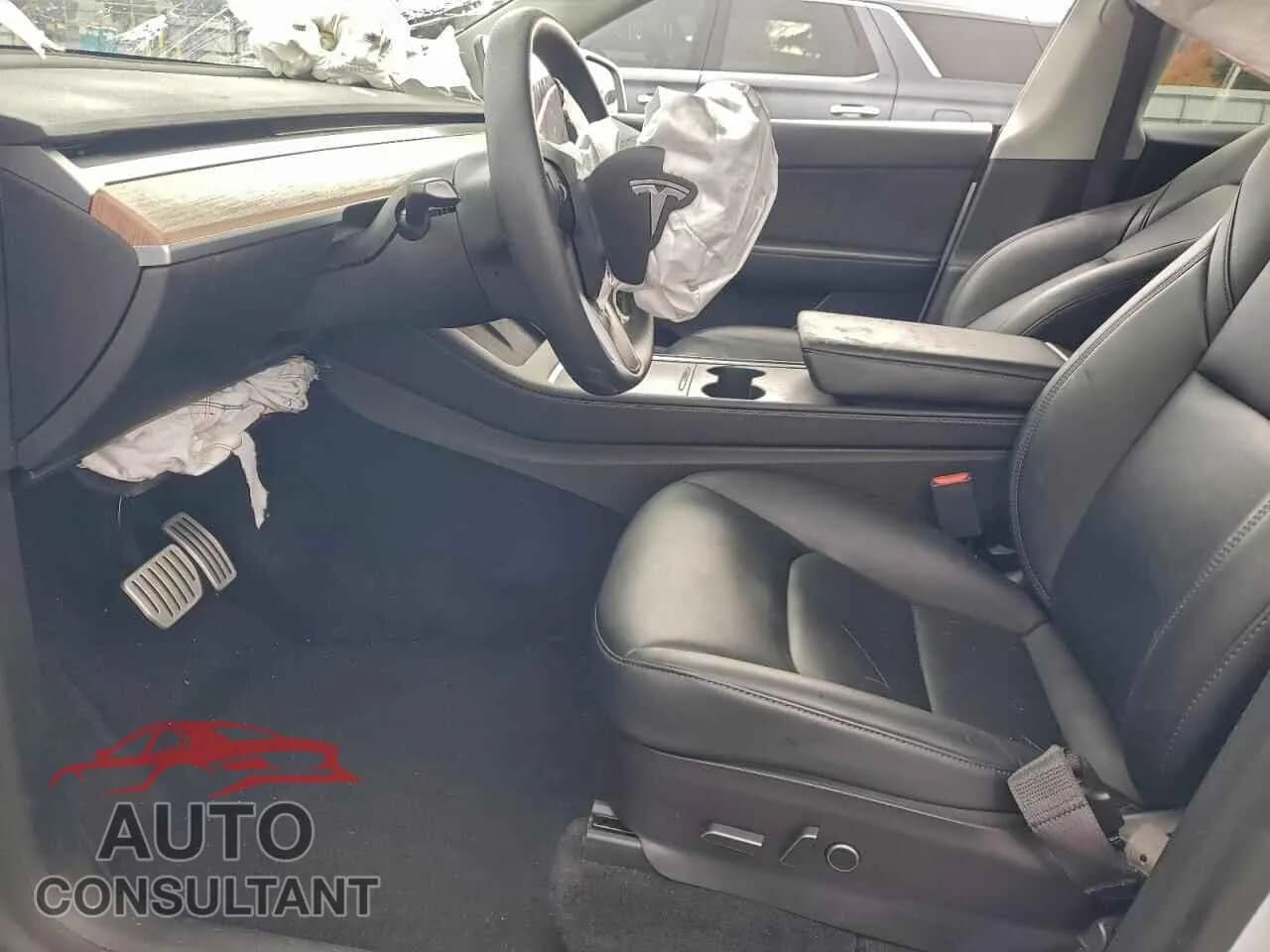 2022 TESLA MODEL Y Damaged VIN 7SAYGDEFXNF485715 – exterior detail 2022 TESLA MODEL Y Damaged VIN 7SAYGDEFXNF485715 – exterior detail