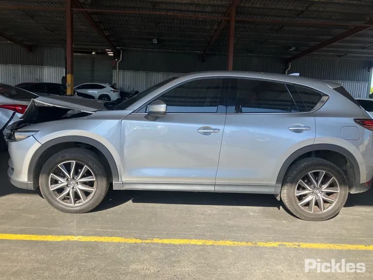 2017 Mazda CX-5 Used VIN JM0KF4WLA00105137 – rear exterior 2017 Mazda CX-5 Used VIN JM0KF4WLA00105137 – rear exterior