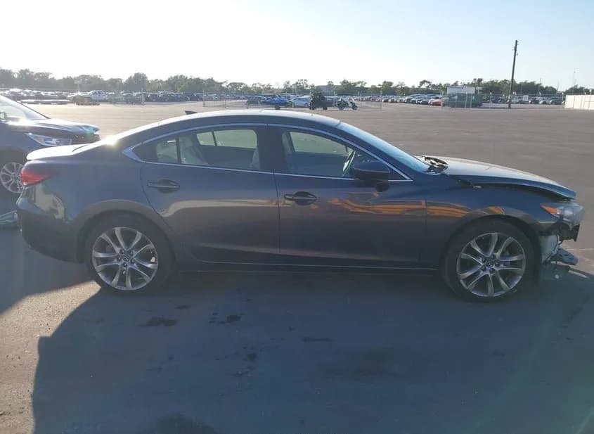 2014 MAZDA Mazda6 Used VIN JM1GJ1W66E1130721 – front exterior 2014 MAZDA Mazda6 Used VIN JM1GJ1W66E1130721 – front exterior