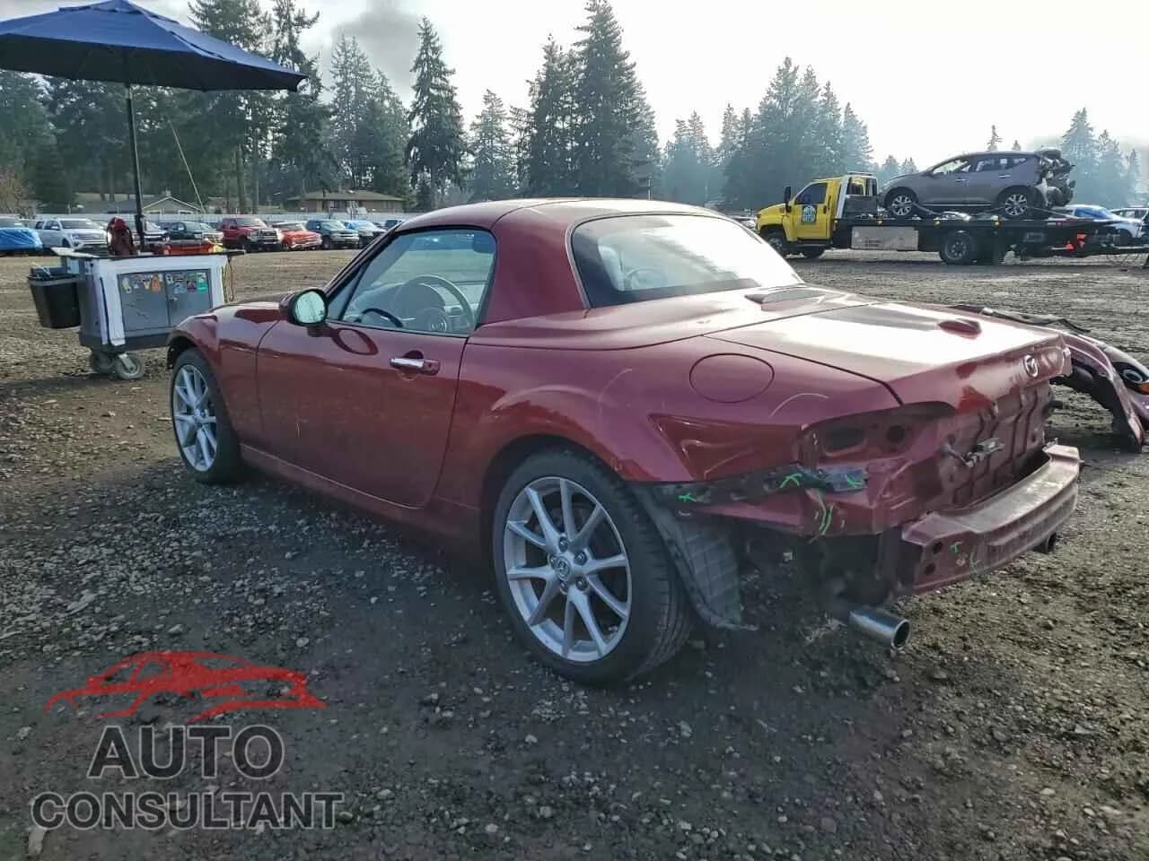 2011 MAZDA MX5 Damaged VIN JM1NC2PF8B0216376 – rear exterior 2011 MAZDA MX5 Damaged VIN JM1NC2PF8B0216376 – rear exterior