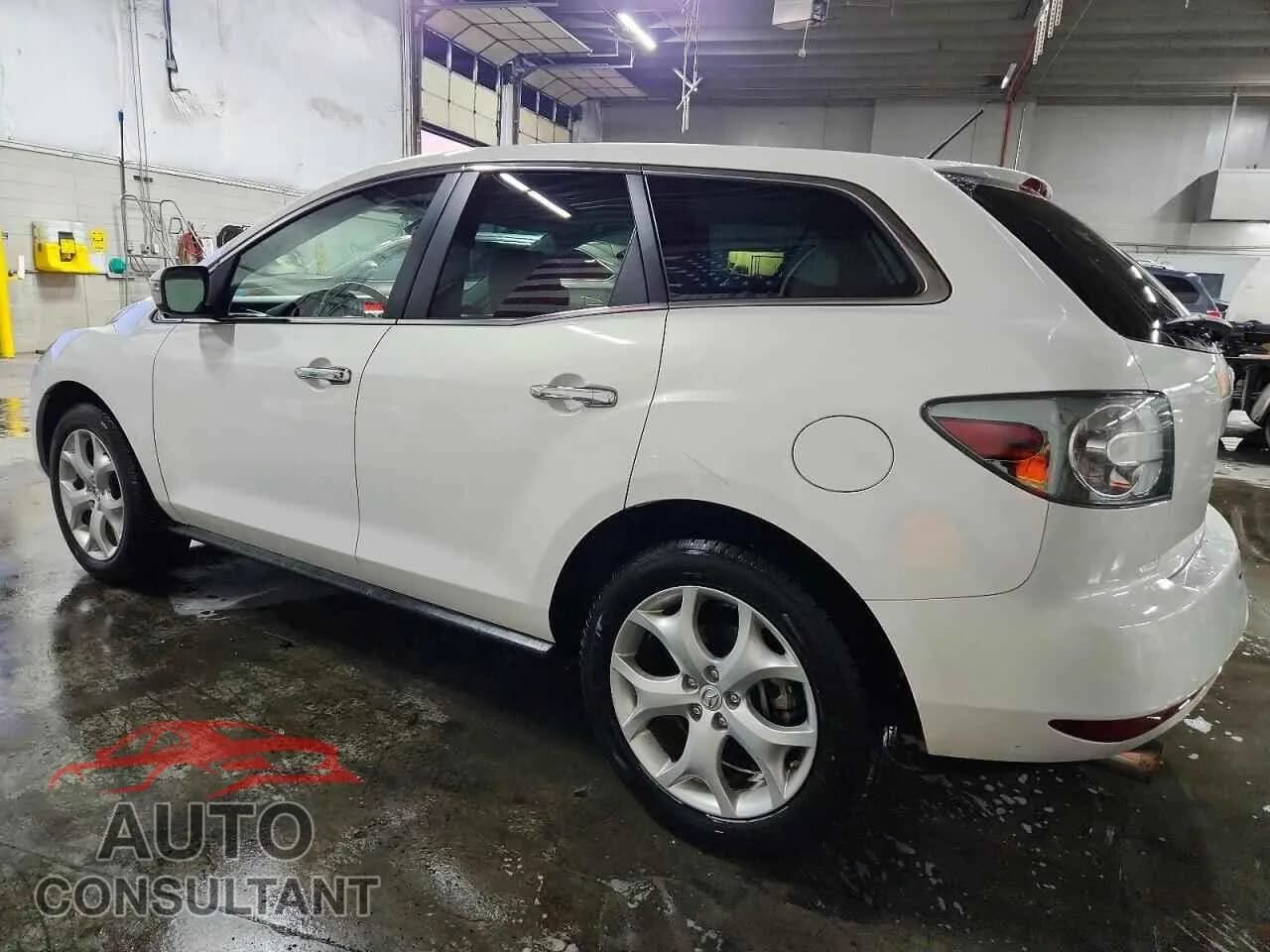 2010 MAZDA CX-7 Damaged VIN JM3ER4W36A0303281 – rear exterior 2010 MAZDA CX-7 Damaged VIN JM3ER4W36A0303281 – rear exterior