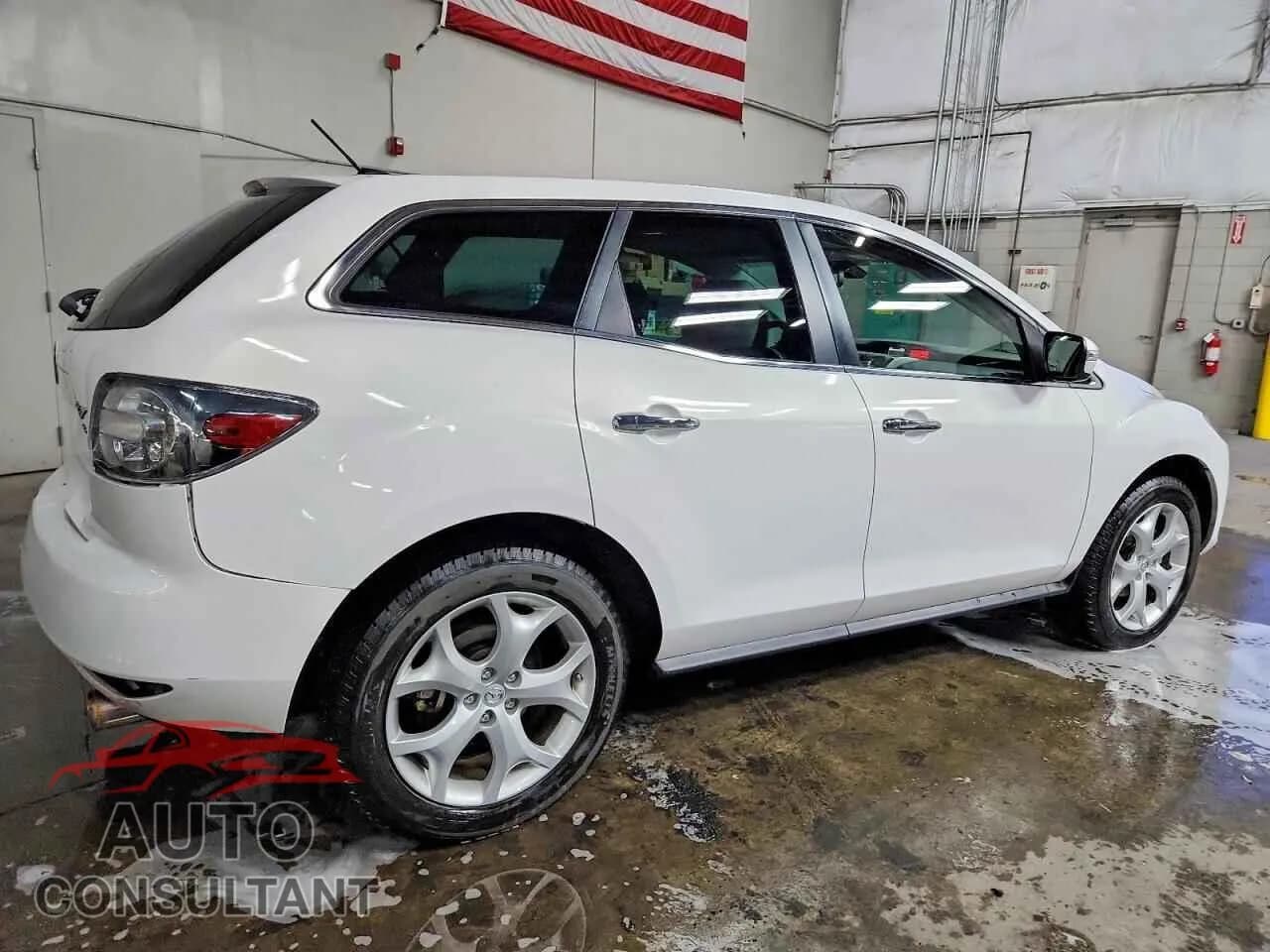 2010 MAZDA CX-7 Damaged VIN JM3ER4W36A0303281 – side profile 2010 MAZDA CX-7 Damaged VIN JM3ER4W36A0303281 – side profile