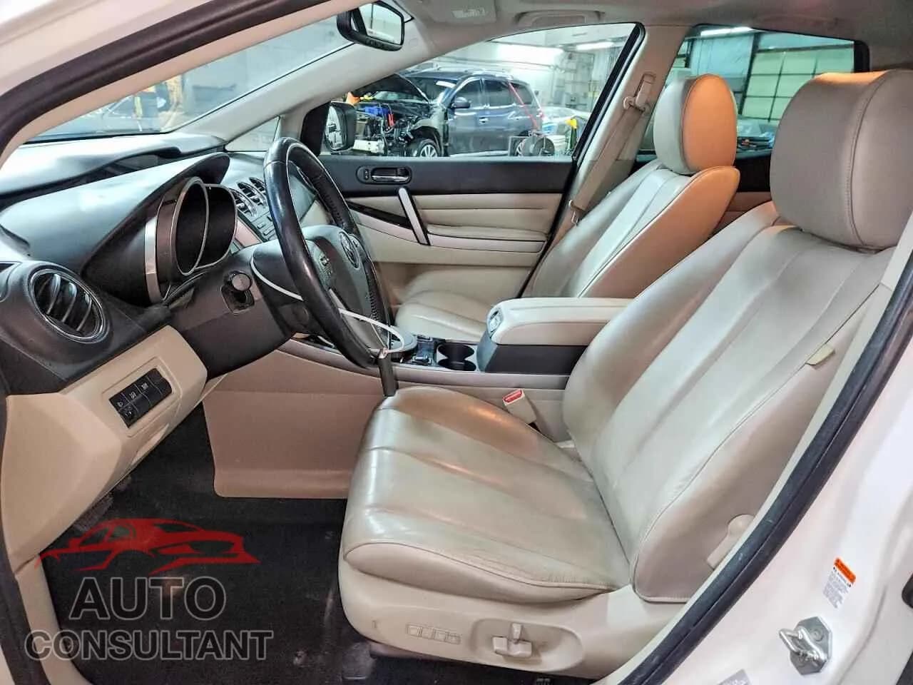 2010 MAZDA CX-7 Damaged VIN JM3ER4W36A0303281 – exterior detail 2010 MAZDA CX-7 Damaged VIN JM3ER4W36A0303281 – exterior detail