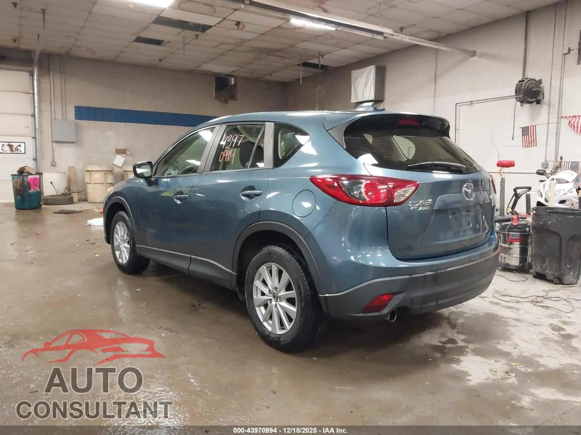 2015 MAZDA CX-5 Damaged VIN JM3KE4BY5F0511417 – side profile 2015 MAZDA CX-5 Damaged VIN JM3KE4BY5F0511417 – side profile