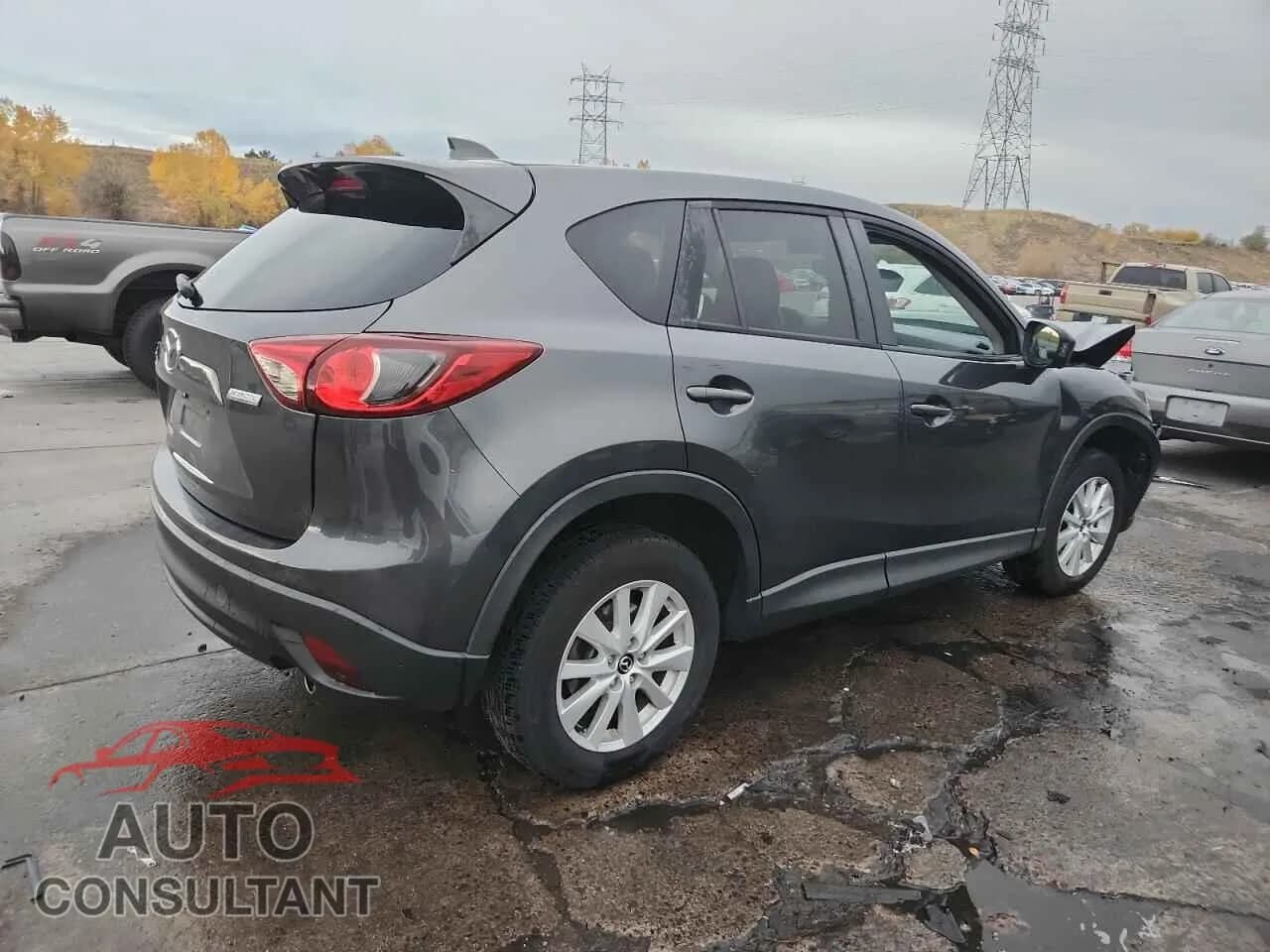 2014 MAZDA CX-5 Damaged VIN JM3KE4CYXE0368784 – side profile 2014 MAZDA CX-5 Damaged VIN JM3KE4CYXE0368784 – side profile