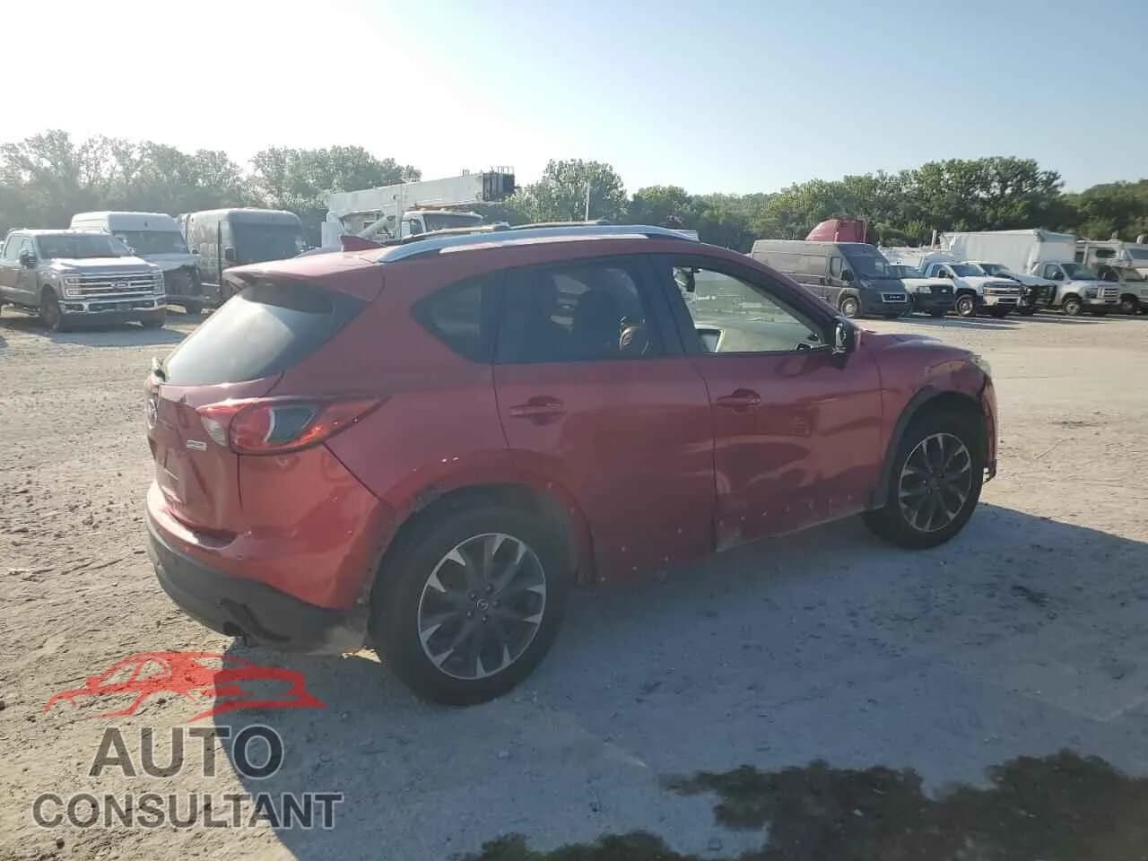 2016 MAZDA CX-5 Damaged VIN JM3KE4DY2G0749143 – side profile 2016 MAZDA CX-5 Damaged VIN JM3KE4DY2G0749143 – side profile