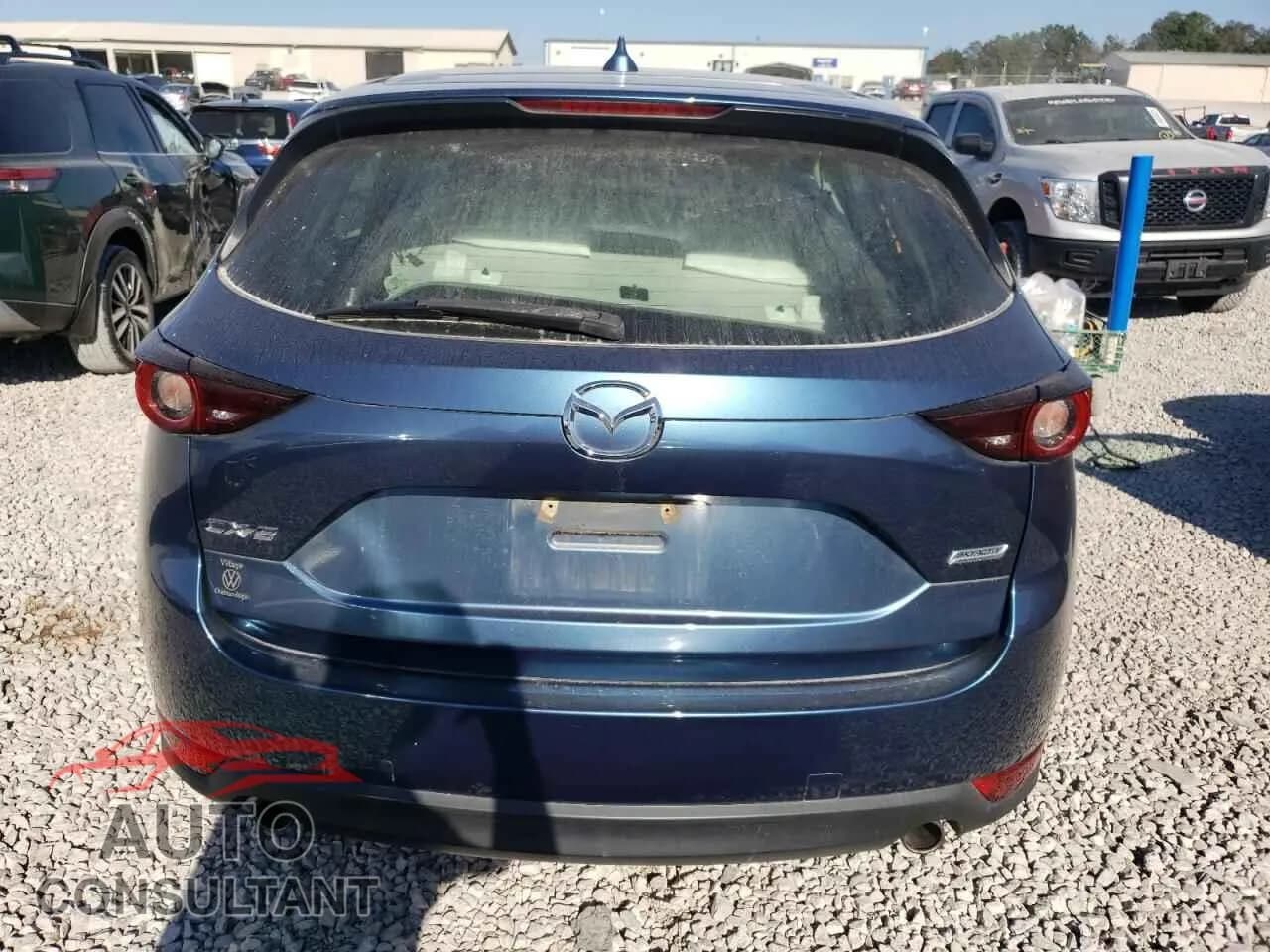 2018 MAZDA CX-5 Used VIN JM3KFABM7J1402954 – engine bay 2018 MAZDA CX-5 Used VIN JM3KFABM7J1402954 – engine bay