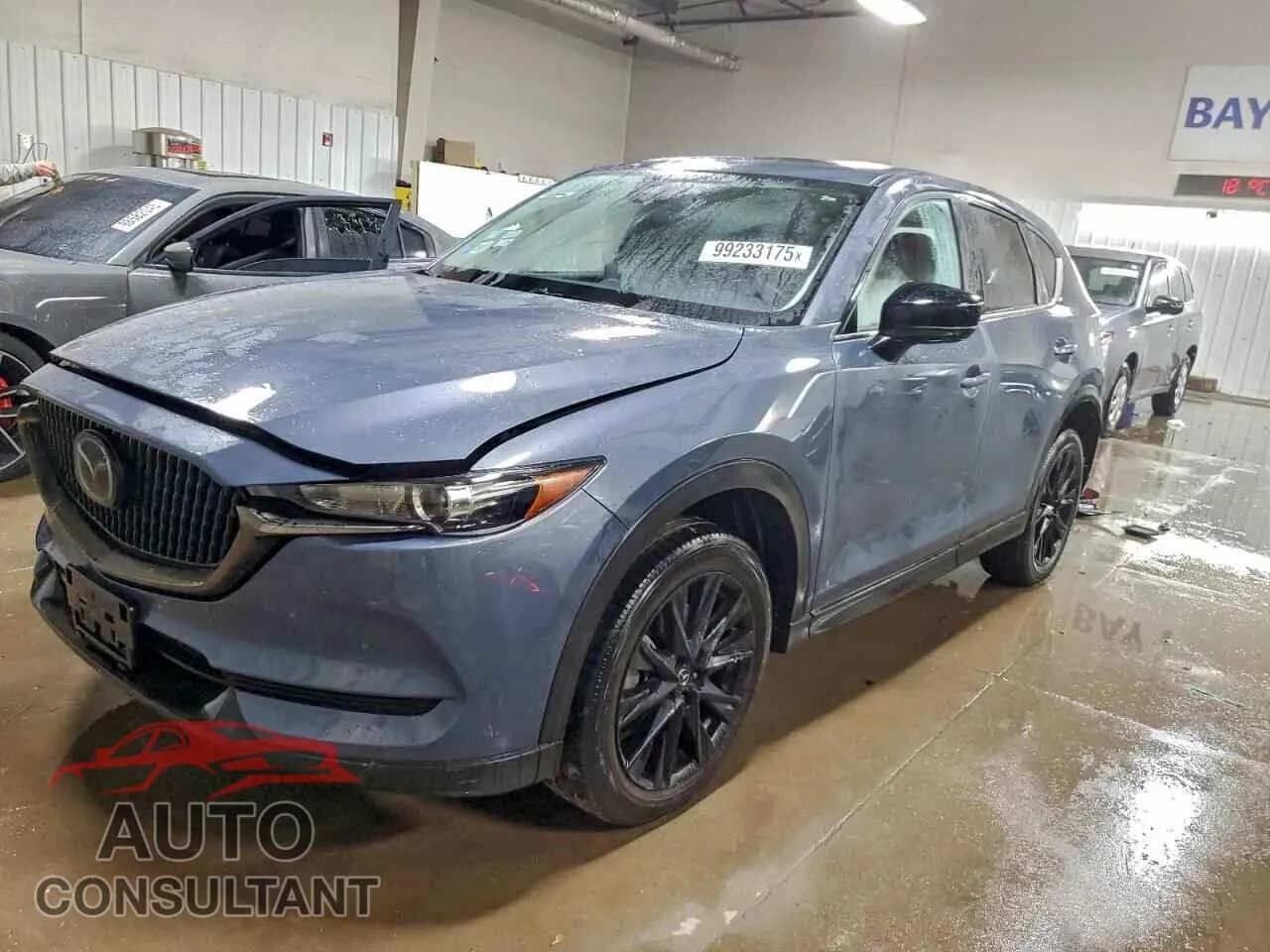 2021 MAZDA CX-5 CARBO Damaged VIN JM3KFBCY2M0465526 – front exterior 2021 MAZDA CX-5 CARBO Damaged VIN JM3KFBCY2M0465526 – front exterior