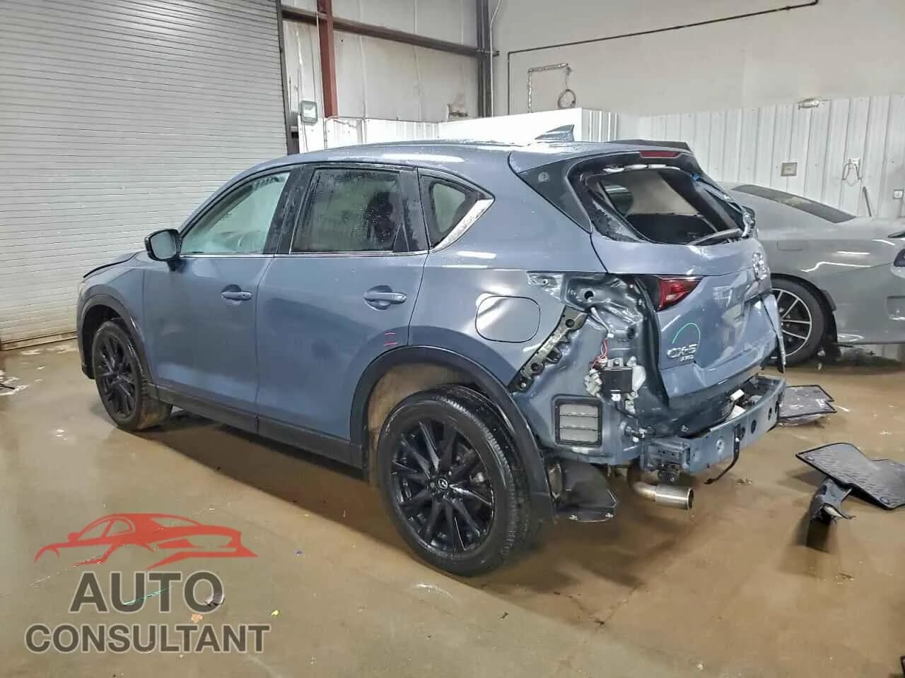 2021 MAZDA CX-5 CARBO Damaged VIN JM3KFBCY2M0465526 – rear exterior 2021 MAZDA CX-5 CARBO Damaged VIN JM3KFBCY2M0465526 – rear exterior