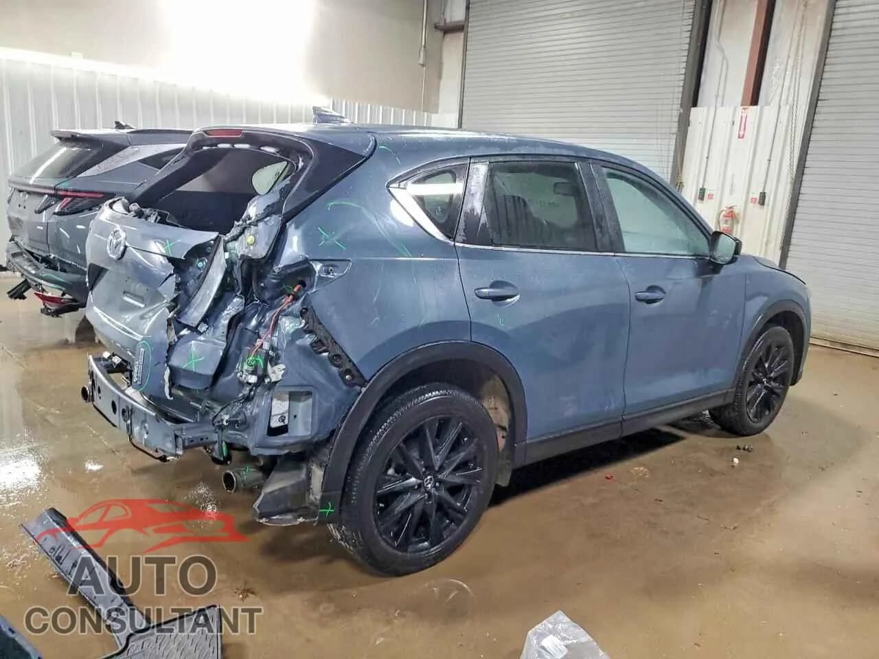 2021 MAZDA CX-5 CARBO Damaged VIN JM3KFBCY2M0465526 – side profile 2021 MAZDA CX-5 CARBO Damaged VIN JM3KFBCY2M0465526 – side profile