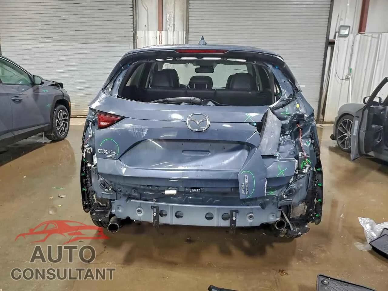 2021 MAZDA CX-5 CARBO Damaged VIN JM3KFBCY2M0465526 – engine bay 2021 MAZDA CX-5 CARBO Damaged VIN JM3KFBCY2M0465526 – engine bay