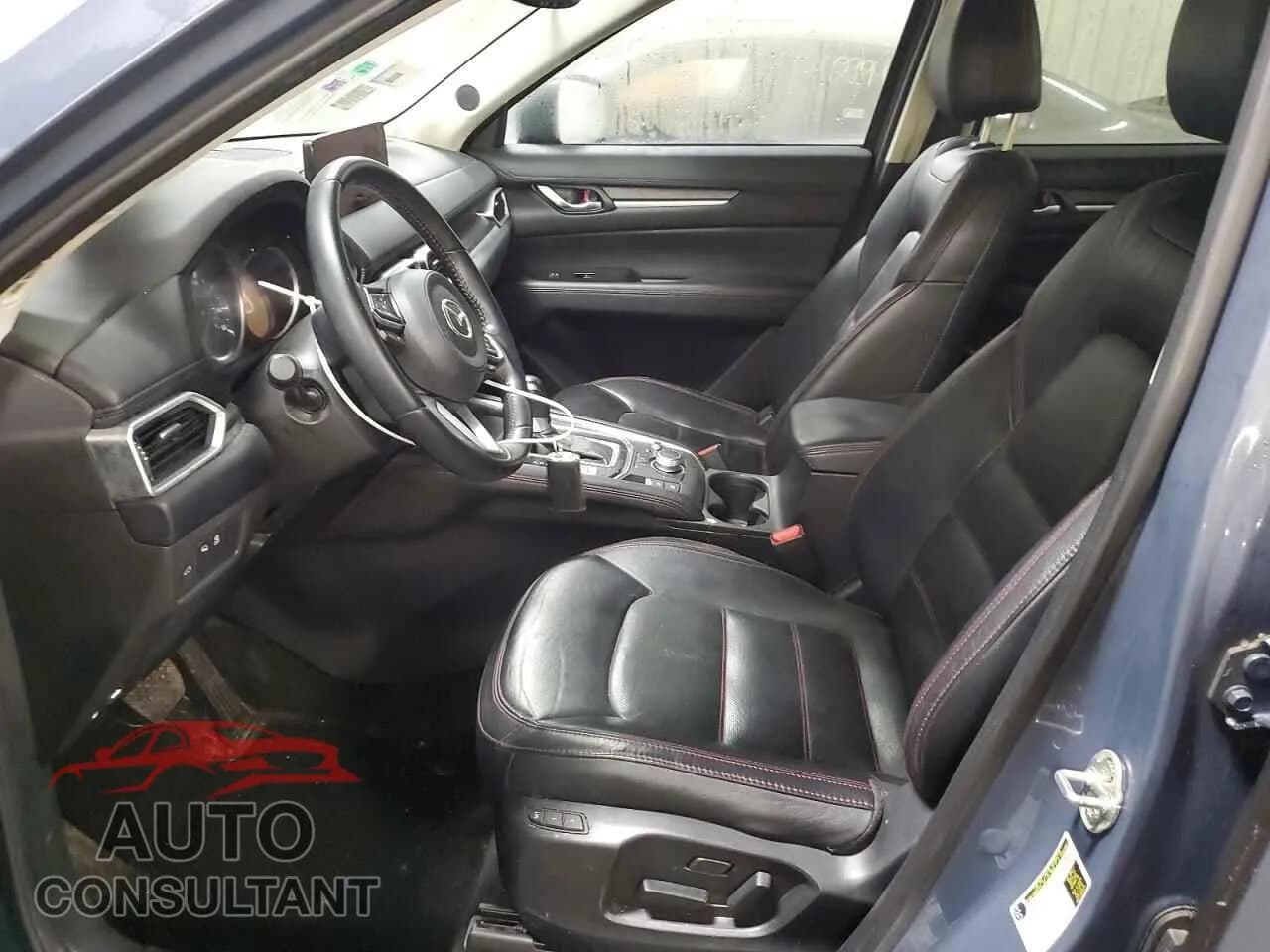2021 MAZDA CX-5 CARBO Damaged VIN JM3KFBCY2M0465526 – exterior detail 2021 MAZDA CX-5 CARBO Damaged VIN JM3KFBCY2M0465526 – exterior detail
