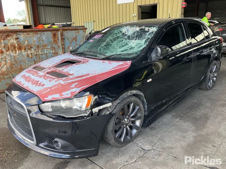 2009 Mitsubishi Lancer Used VIN JMFLMCX4A9U000438 – rear exterior 2009 Mitsubishi Lancer Used VIN JMFLMCX4A9U000438 – rear exterior