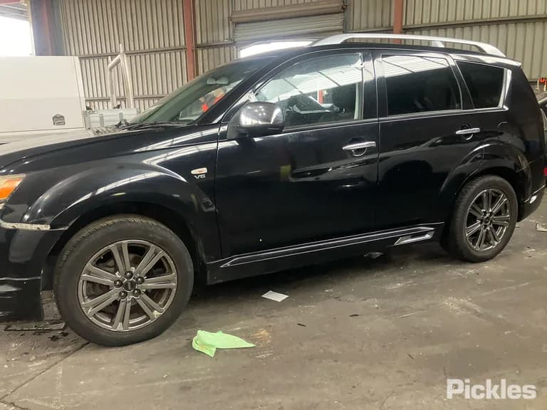 2009 Mitsubishi Outlander Used VIN JMFXLCW6W9Z000786 – photo 13 2009 Mitsubishi Outlander Used VIN JMFXLCW6W9Z000786 – photo 13