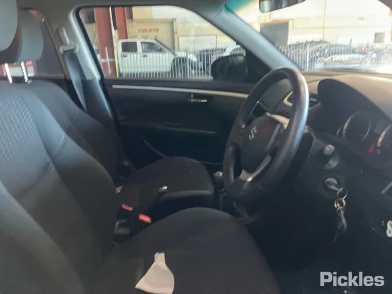 2014 Suzuki Swift Used VIN JSAFZC82S00302992 – exterior detail 2014 Suzuki Swift Used VIN JSAFZC82S00302992 – exterior detail