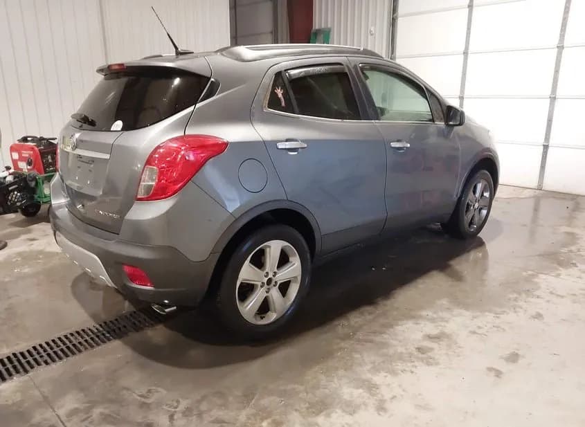 2013 BUICK ENCORE Used VIN KL4CJBSB3DB063554 – rear exterior 2013 BUICK ENCORE Used VIN KL4CJBSB3DB063554 – rear exterior