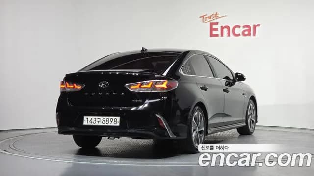 2018 Hyundai Sonata New Rise Hybrid Premium Sold VIN KMHE5413BJA080115 – rear exterior 2018 Hyundai Sonata New Rise Hybrid Premium Sold VIN KMHE5413BJA080115 – rear exterior