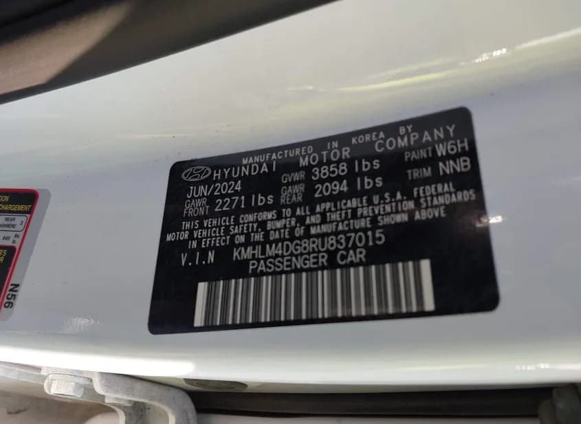 2024 HYUNDAI Elantra Used VIN KMHLM4DG8RU837015 – trunk area 2024 HYUNDAI Elantra Used VIN KMHLM4DG8RU837015 – trunk area
