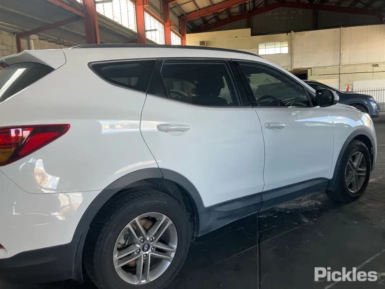 2016 Hyundai Santa Fe Used VIN KMHST81BSHU689057 – rear exterior 2016 Hyundai Santa Fe Used VIN KMHST81BSHU689057 – rear exterior