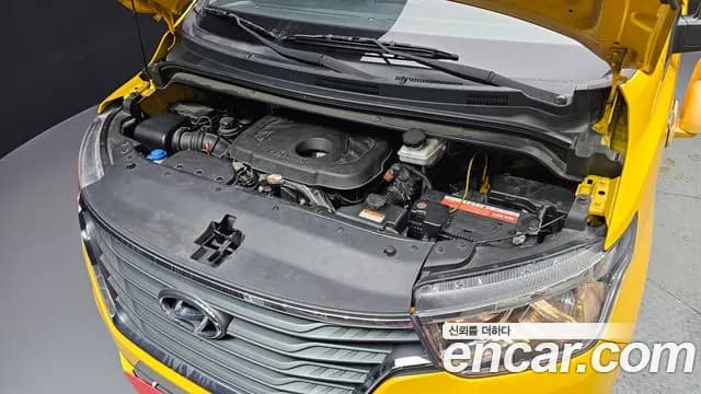 2021 Hyundai The New Grand Starex 4WD School Bus Sold VIN KMJWA37KDMU159291 – exterior detail 2021 Hyundai The New Grand Starex 4WD School Bus Sold VIN KMJWA37KDMU159291 – exterior detail