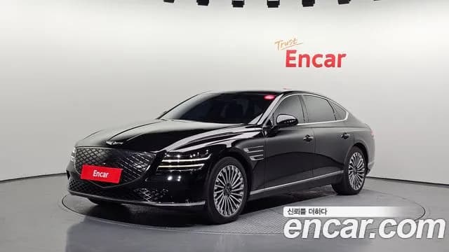2022 Genesis Electrified G80 (RG3) e-AWD Sold VIN KMTGE411PNU001035 – front exterior 2022 Genesis Electrified G80 (RG3) e-AWD Sold VIN KMTGE411PNU001035 – front exterior