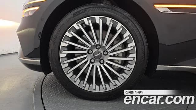 2022 Genesis Electrified G80 (RG3) e-AWD Sold VIN KMTGE411PNU004042 – exterior detail 2022 Genesis Electrified G80 (RG3) e-AWD Sold VIN KMTGE411PNU004042 – exterior detail