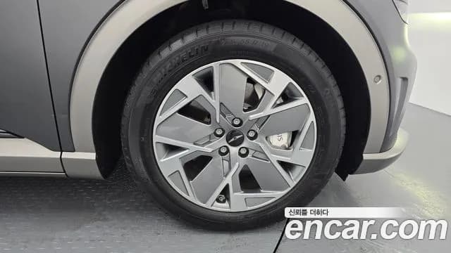 2023 Genesis GV60 Standard AWD Sold VIN KMTKC81CPPU013395 – exterior detail 2023 Genesis GV60 Standard AWD Sold VIN KMTKC81CPPU013395 – exterior detail