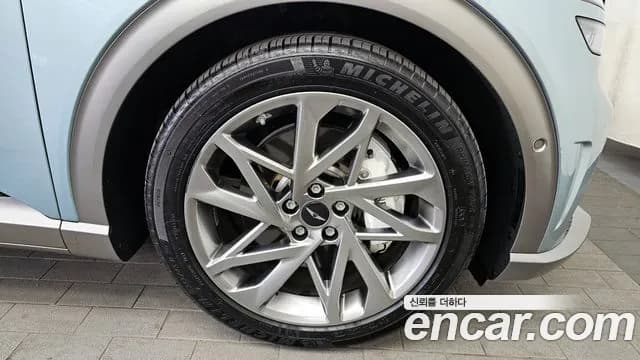 2023 Genesis GV60 Standard AWD Sold VIN KMTKC81CPPU015563 – front exterior 2023 Genesis GV60 Standard AWD Sold VIN KMTKC81CPPU015563 – front exterior