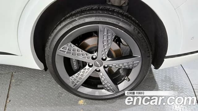 2023 Genesis GV70 2.5T Gasoline AWD Sold VIN KMTMA81BDPU099527 – front exterior 2023 Genesis GV70 2.5T Gasoline AWD Sold VIN KMTMA81BDPU099527 – front exterior