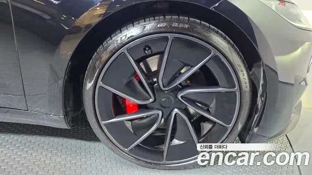 2024 Tesla Model 3 Performance AWD Sold VIN LRW3E7ET111111111 – exterior detail 2024 Tesla Model 3 Performance AWD Sold VIN LRW3E7ET111111111 – exterior detail